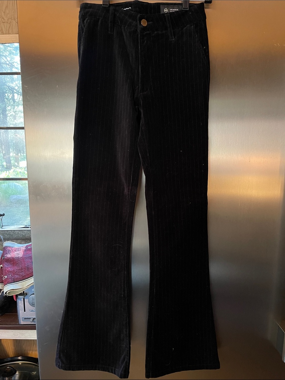 AG mid rise velvet pinstripe jean in black